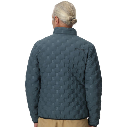 Man wearing a blue quilted jacket on a white background