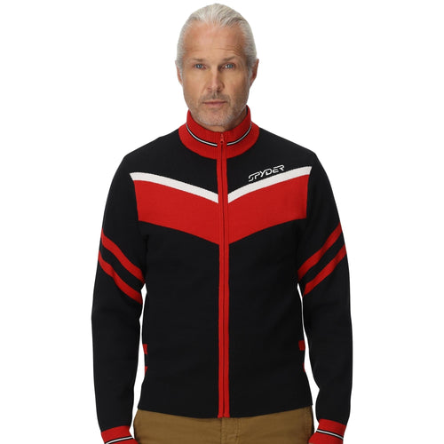 Man wearing a black and red jacket with Spyder logo on a white background
