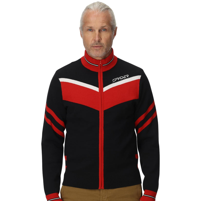 Man wearing a black and red jacket with Spyder logo on a white background