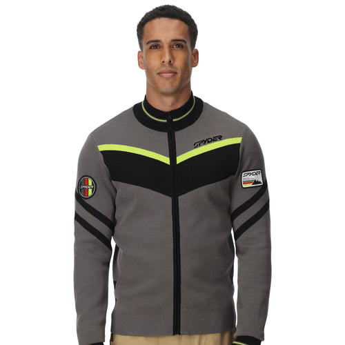 Man wearing a gray jacket with black and yellow accents on a white background