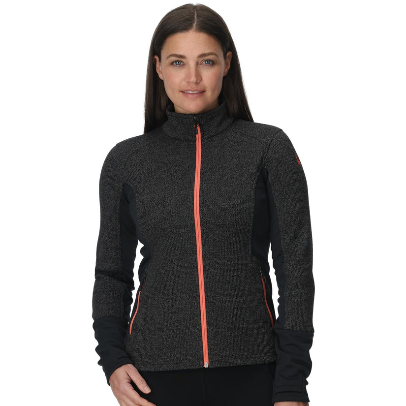 Woman wearing a dark gray jacket with a red zipper on a white background