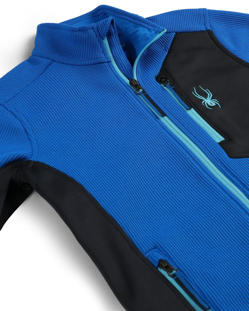 Blue and black jacket with a spider logo on a white background