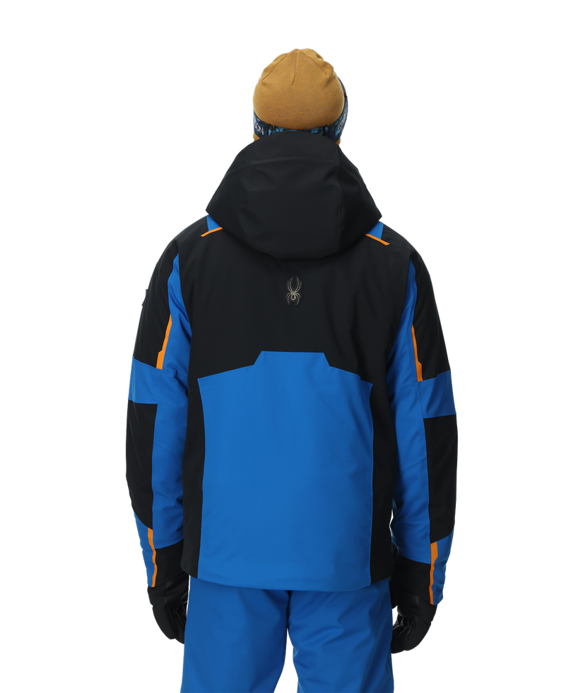 Blue and black winter jacket with orange accents on a white background