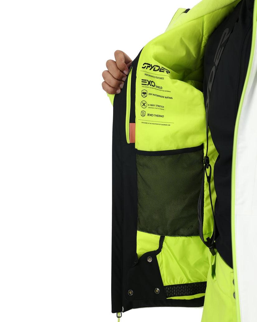 Close-up of a bright yellow and black jacket with visible branding on a white background