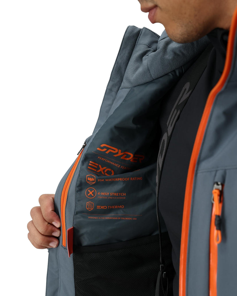 Gray jacket with orange accents and Spyder branding on a white background