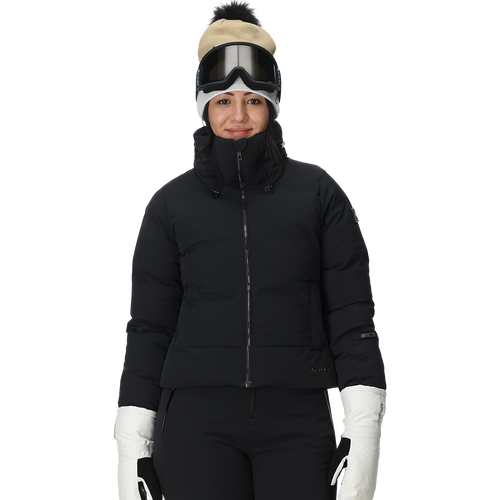 Person wearing a black puffer jacket, white gloves, and a beanie with goggles on a white background