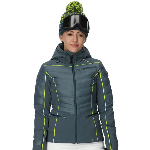 Person wearing a gray ski jacket with green accents on a white background