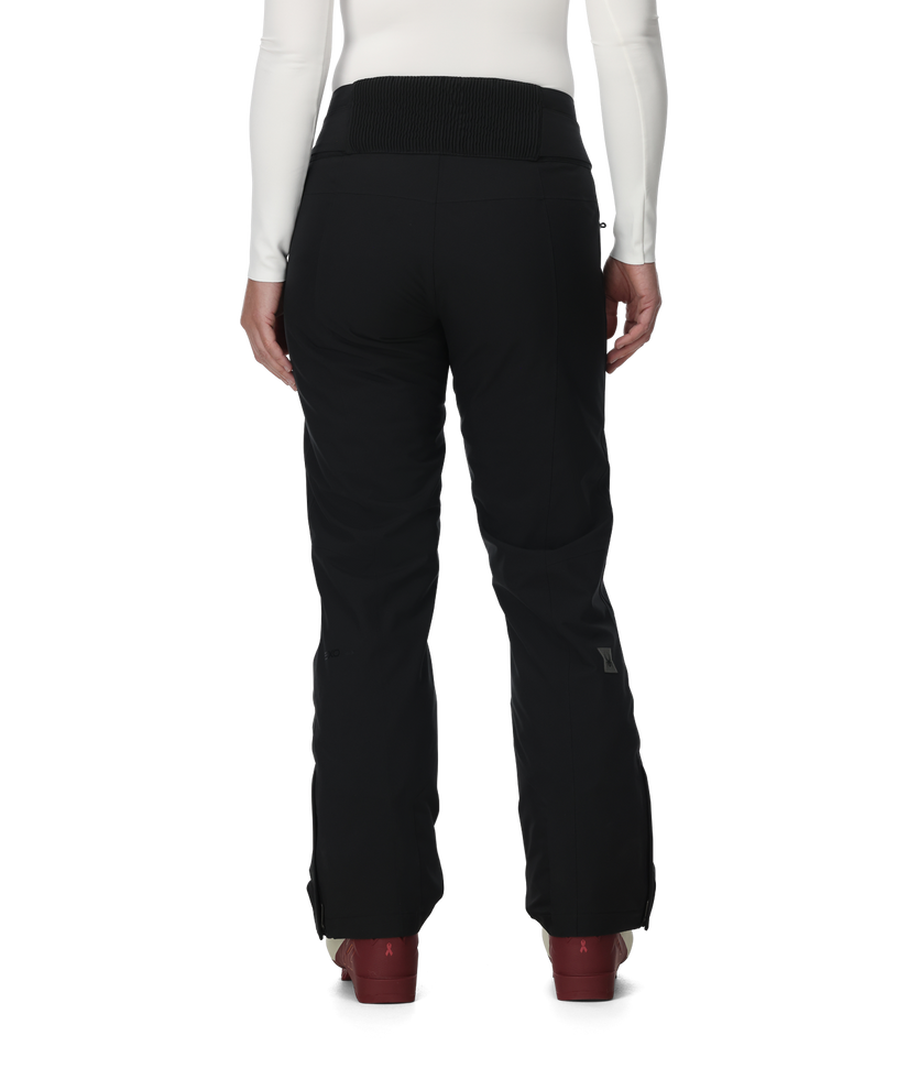 Black pants worn by a person on a white background