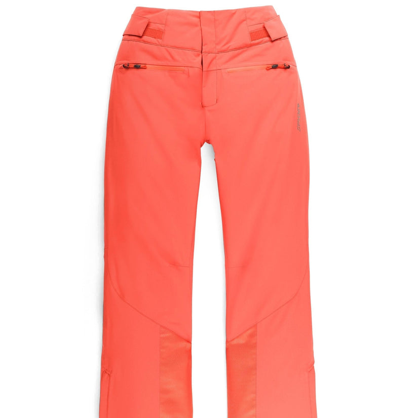 Bright orange ski pants on a white background