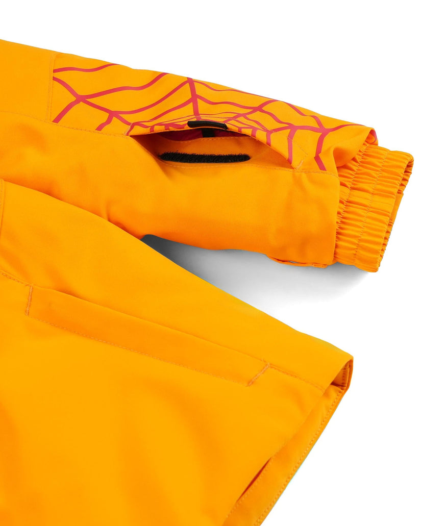 Orange pants with a spider web design on a white background