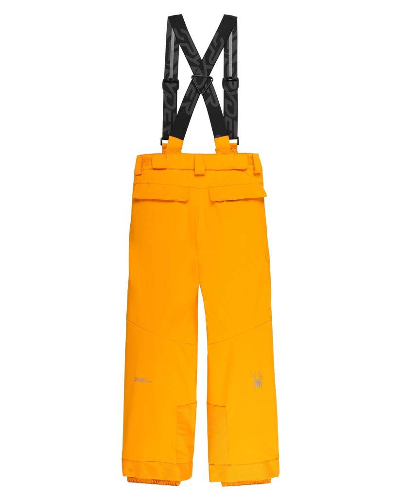 Yellow snow pants with black suspenders on a white background