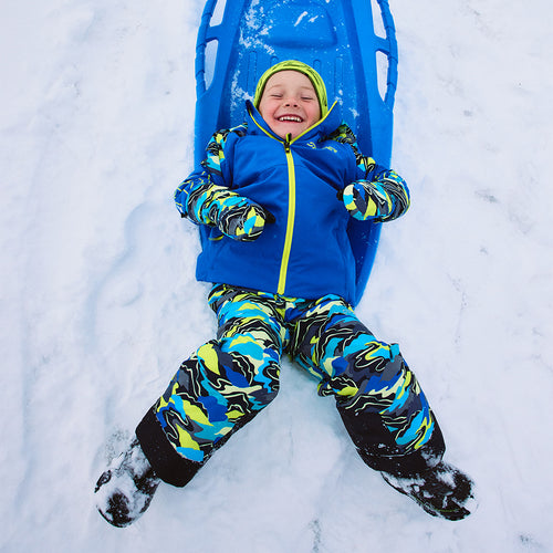 Black sleeveless top and pants with colorful camouflage pattern on a white background